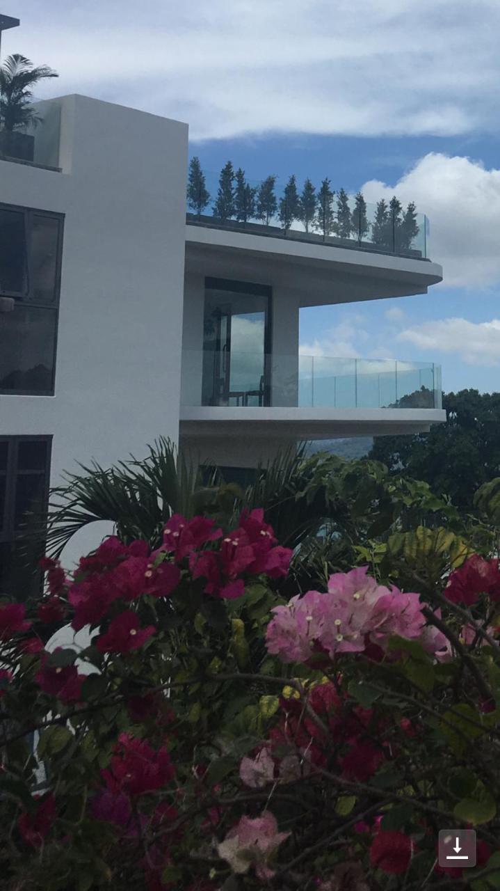 Patong Heights Otel Dış mekan fotoğraf A view of the house from the garden