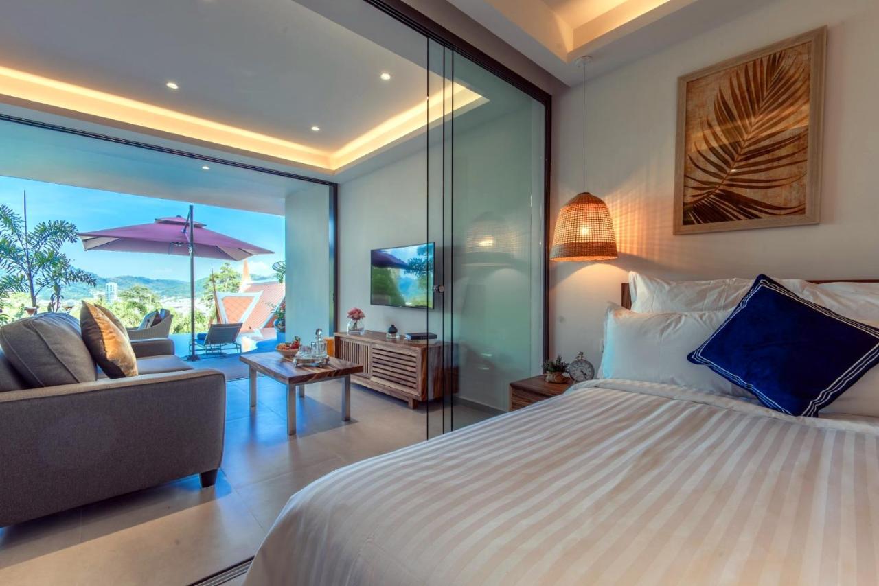 Patong Heights Otel Dış mekan fotoğraf A bedroom at the hotel